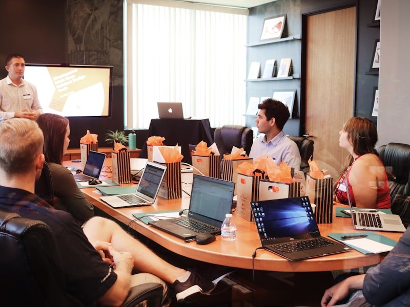 Employee team meeting representing an ownership transition